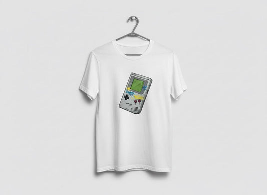 White t-shirt with a retro game console design on a hanger against a light gray background